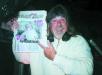 Batman proudly displaying his copy of Coconut Times as the first ever person to grace the cover - at The Big Kahuna, 2001.